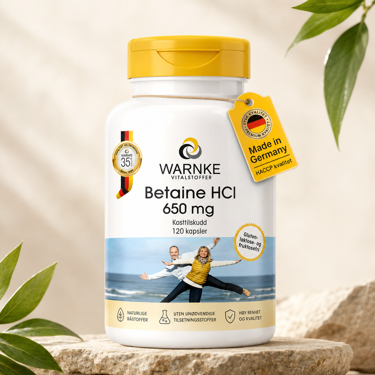 Betaine HCl 650 mg kapsler i en hvit beholder med gult lokk, etikett med detaljer om produkt og opprinnelse.