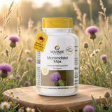 Récipient Max de chardon-Marie avec corps blanc et bouchon à vis jaune, placé sur une surface en bois avec des fleurs violettes en arrière-plan.