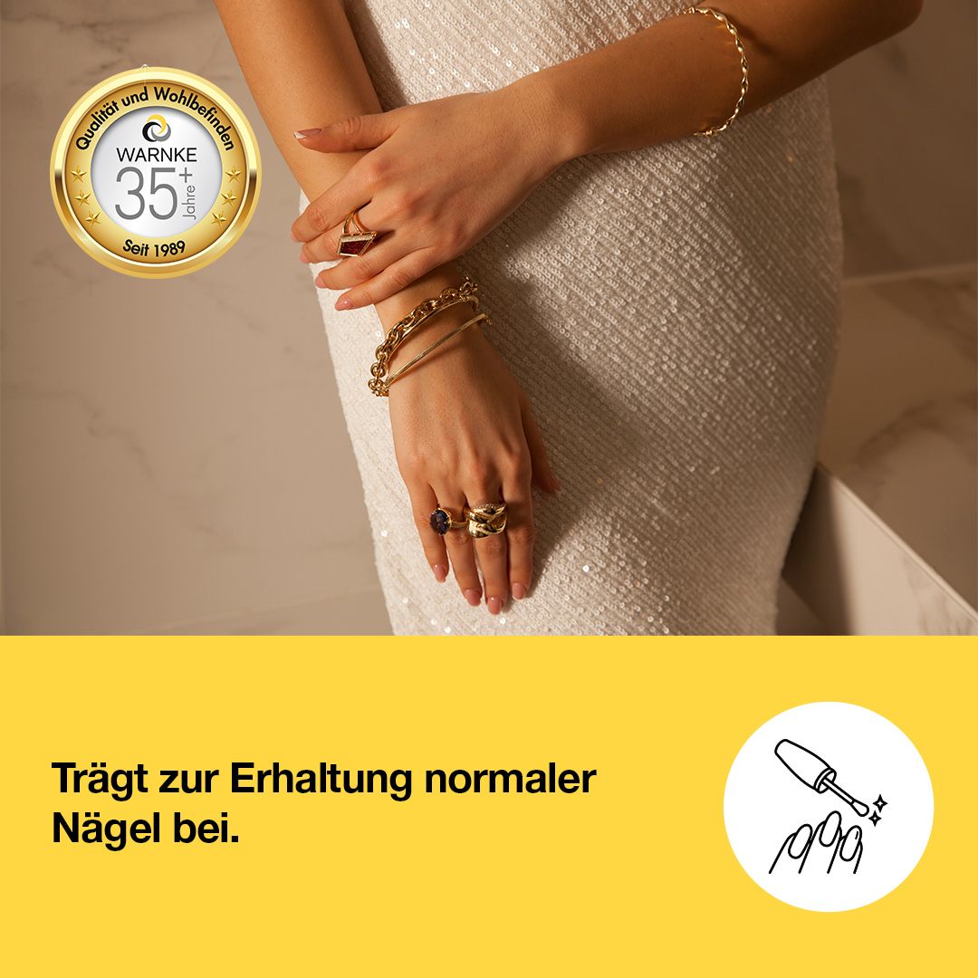 Hyaluron 500 + zinc tablets, film coated, shown with hands adorned in gold, elegant presentation.