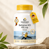 Capsule di betaina HCl da 650 mg in un contenitore bianco con tappo giallo, etichetta con dettagli del prodotto e origine.