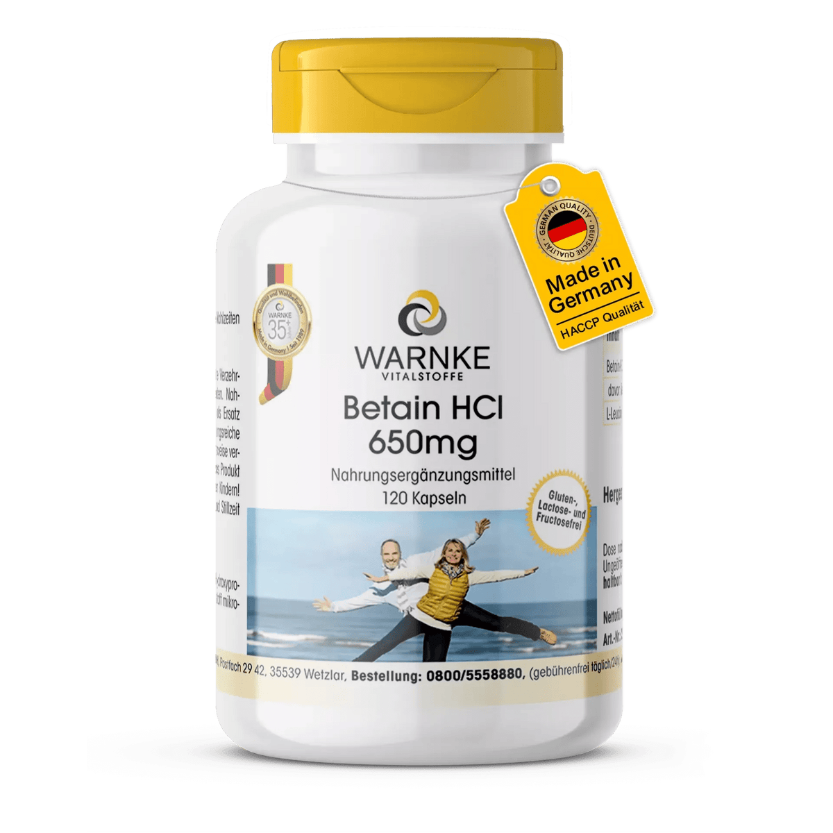 Il contenitore per capsule con coperchio giallo, etichettato "Betaina HCI 650 mg", contiene 120 capsule vegane.