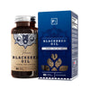 Huile de nigelle dans un récipient en verre marron contenant 90 capsules molles végétaliennes, dans un emballage bleu et crème.