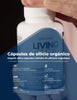 Hvitt, plastikkflaske med blå tekst som beskriver LIVING SILICA® kapsler. Flasken er åpen med en hånd som holder lokket.